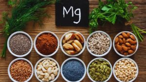 magnesium-rich foods, benefits of magnesium, foods high in magnesium, magnesium for heart health, magnesium and diabetes, magnesium in almonds, magnesium sources, healthy diet tips, Green leafy vegetables, legumes, seafood, whole grains, nuts and seeds